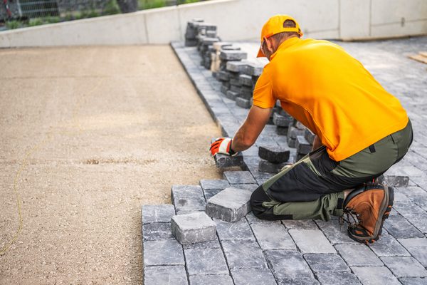Concrete and paver driveway and patio installation